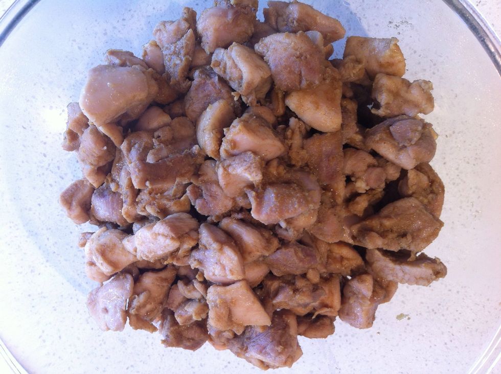 Take the chicken out of the pot and leave aside in a bowl