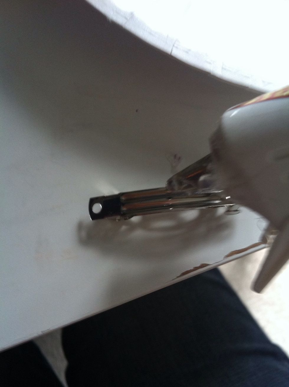 Take the clip you want and glue it to the back of the bow