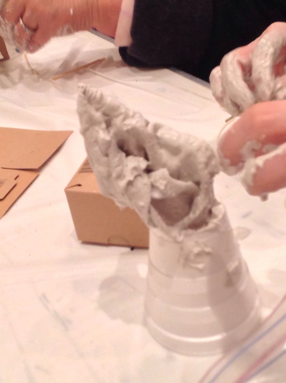 Take the coated fabric and drape it on your wire/skewer creation.