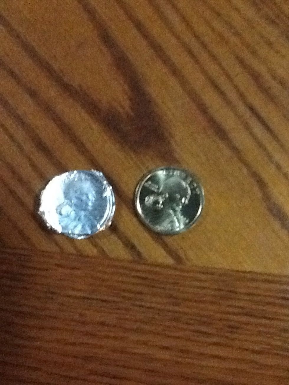 Take the coin out gently.