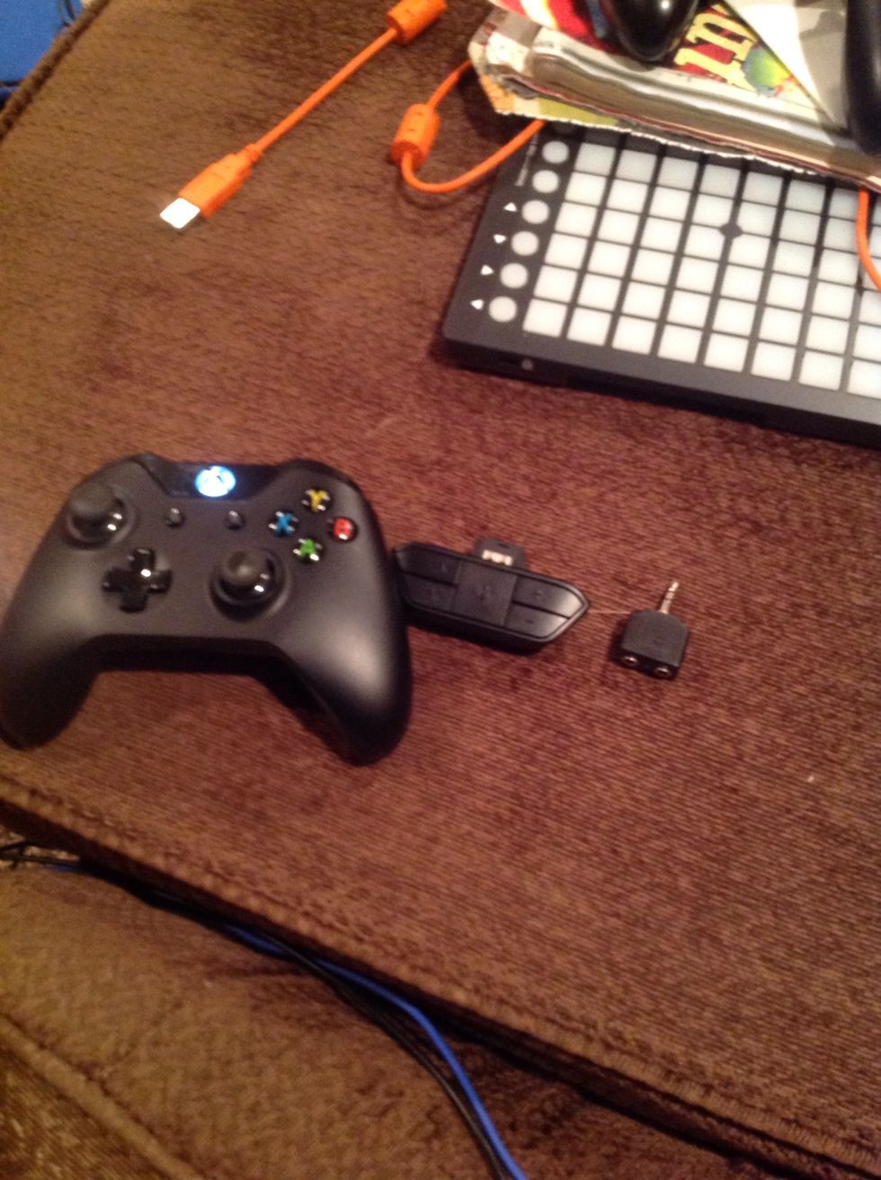 Take the controller, mic adaptor, and splitter