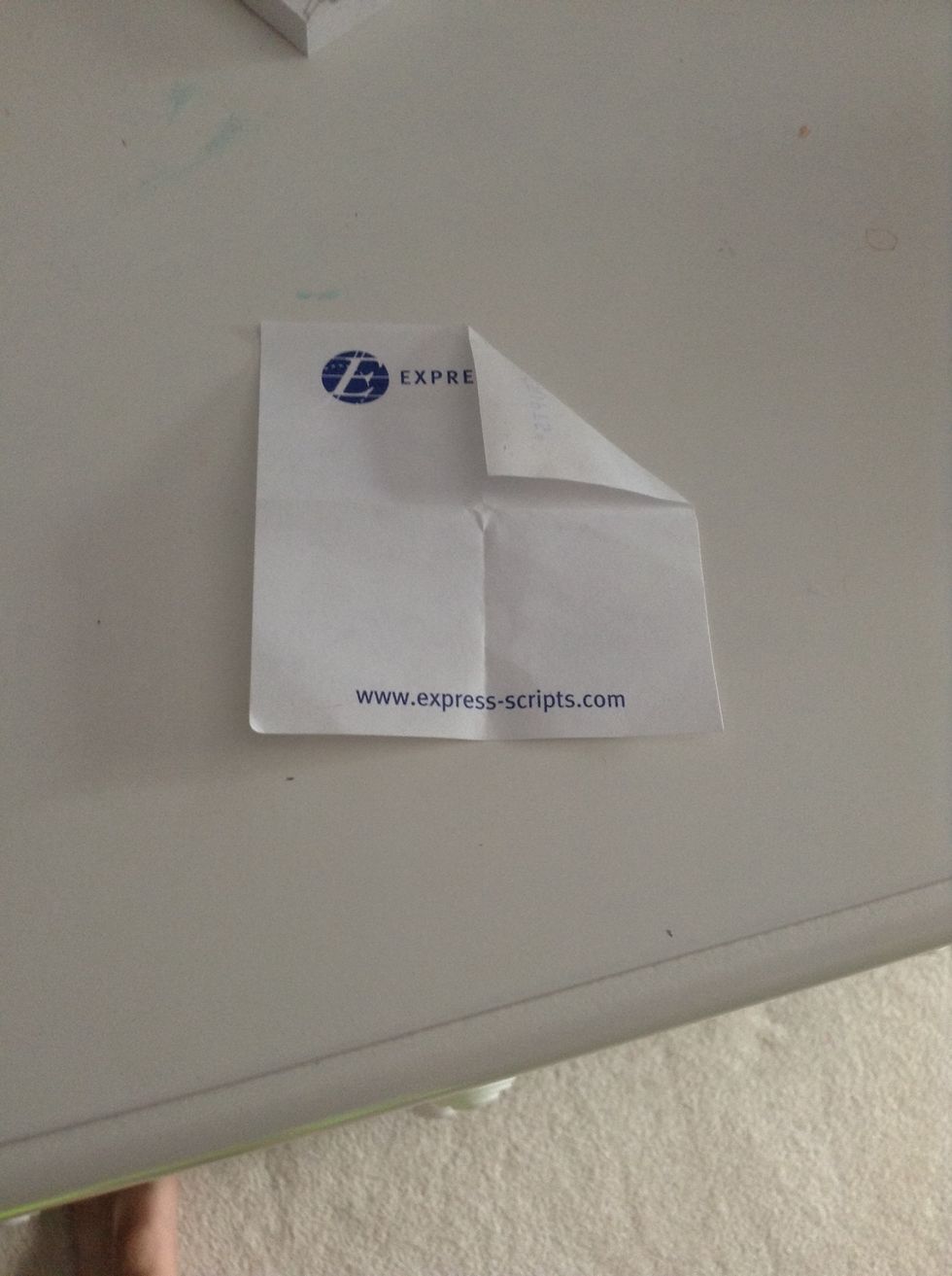 Take the corners and fold them to the middle point.