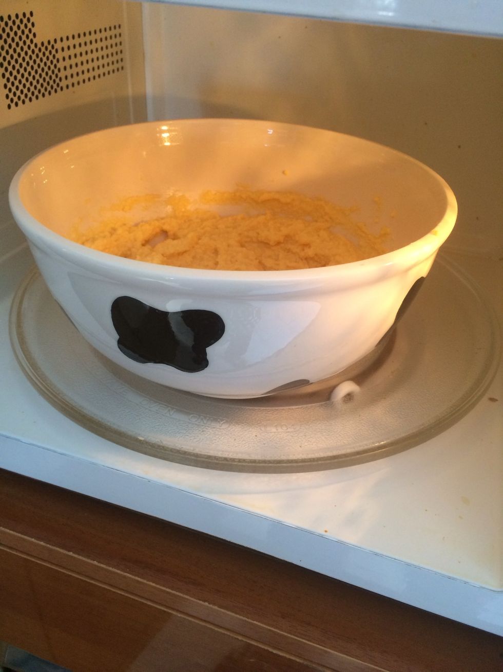 Take the cornmeal mixture and put it into a microwave and heat for 90 sec.