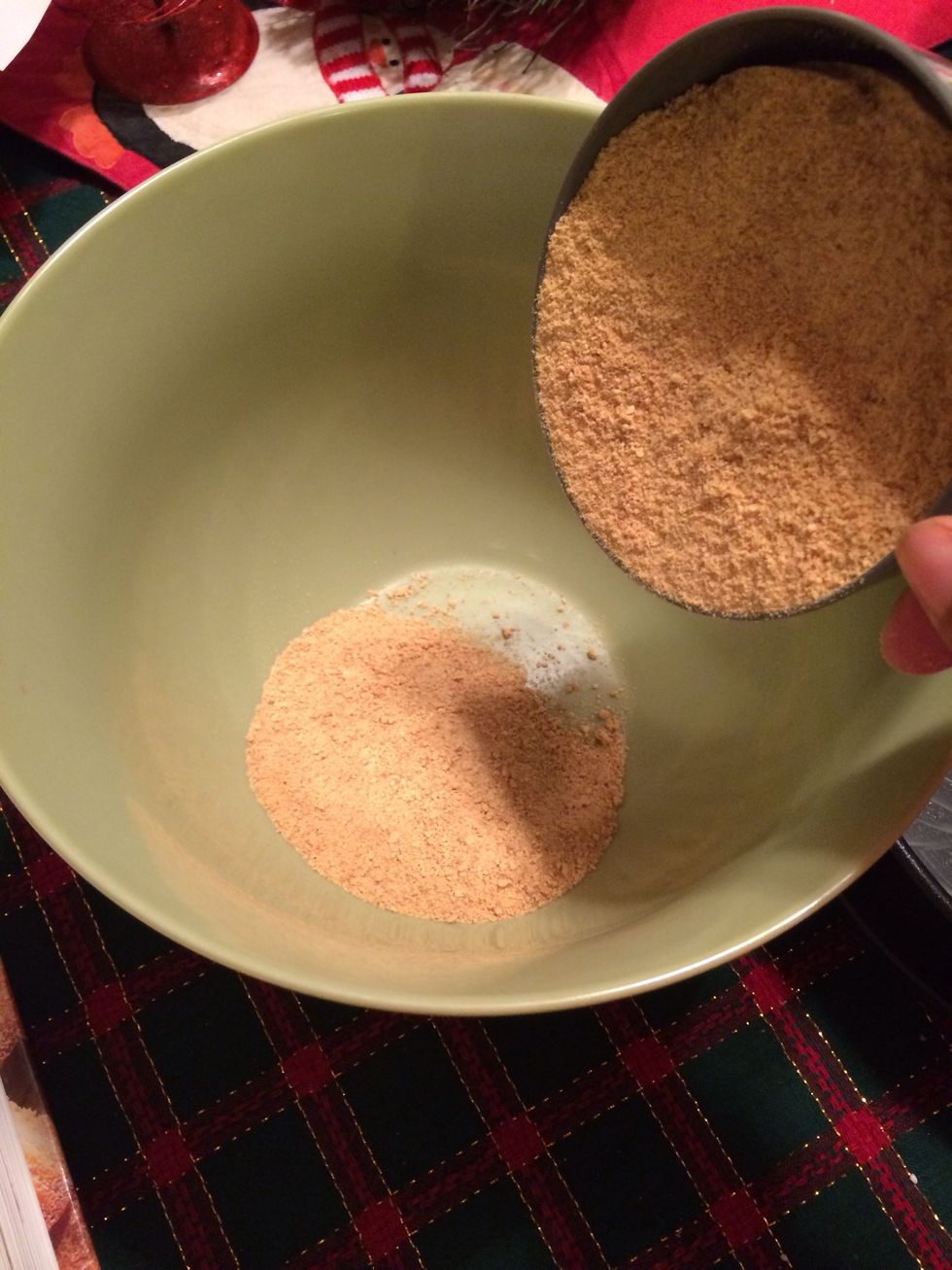 Take the cracker crumbs and put it in a bowl