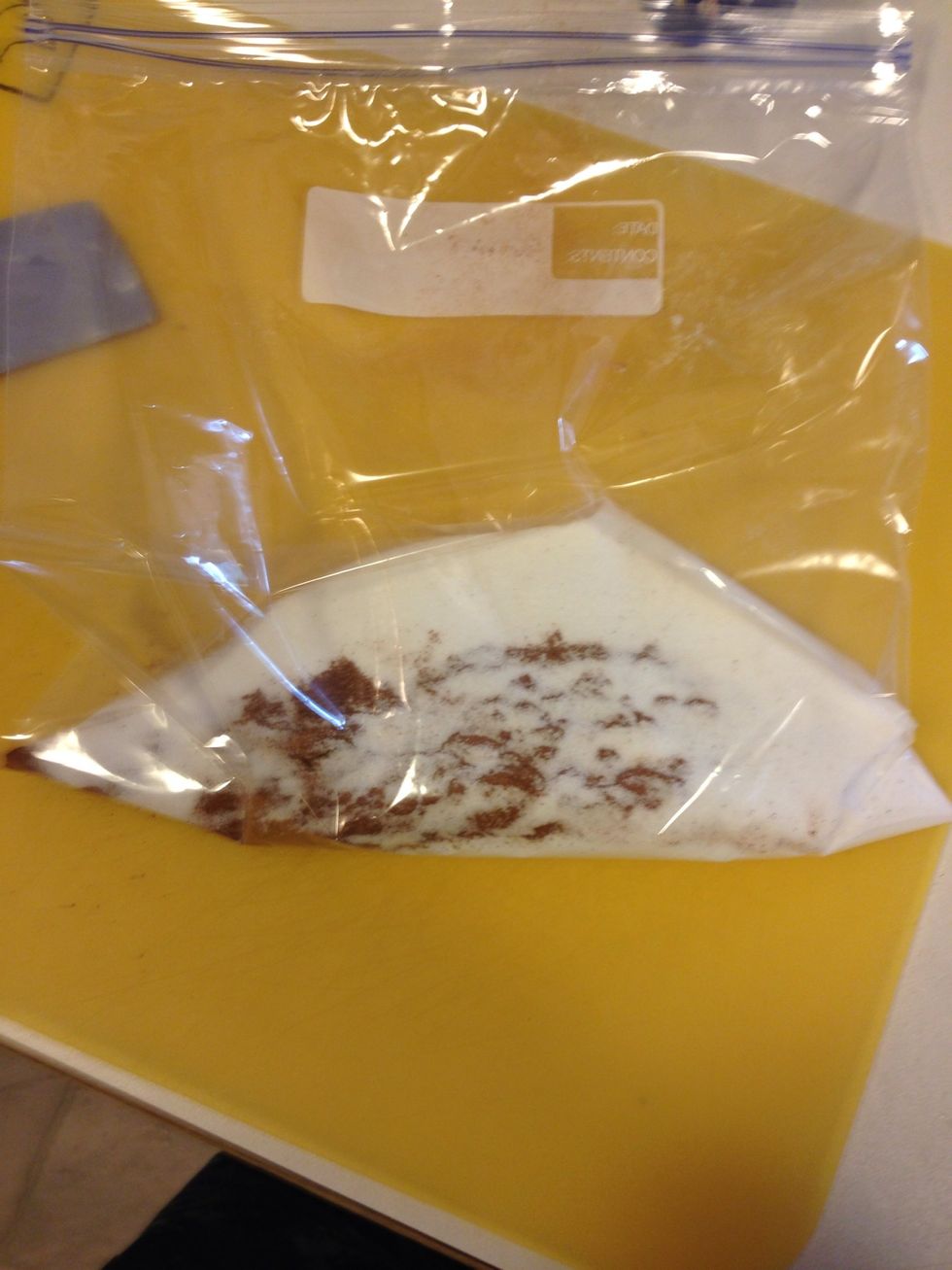Take the cup of sugar and cinnamon and add them to a ziploc bag. Shake it up to mix it