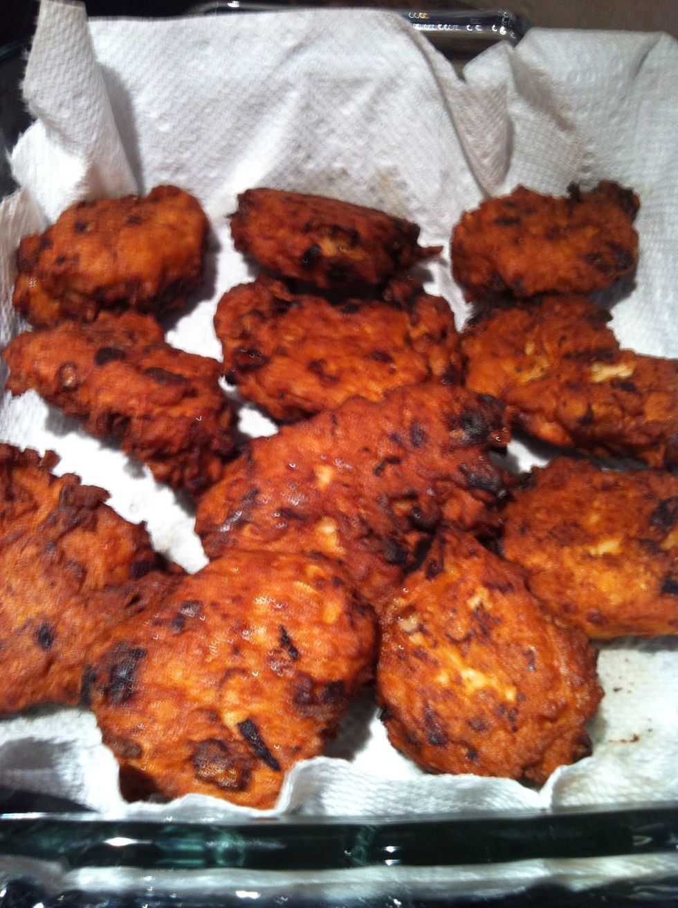 Take the cutlets out and place on a paper towel to soak the extra oil.