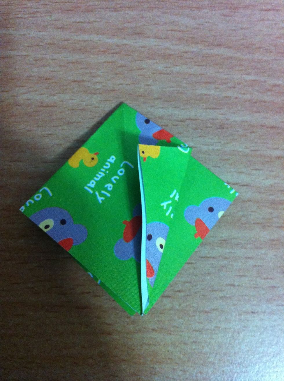 Take the edge and fold to the middle