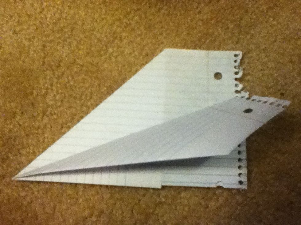 take the edge farthest from the center and fold it to the center