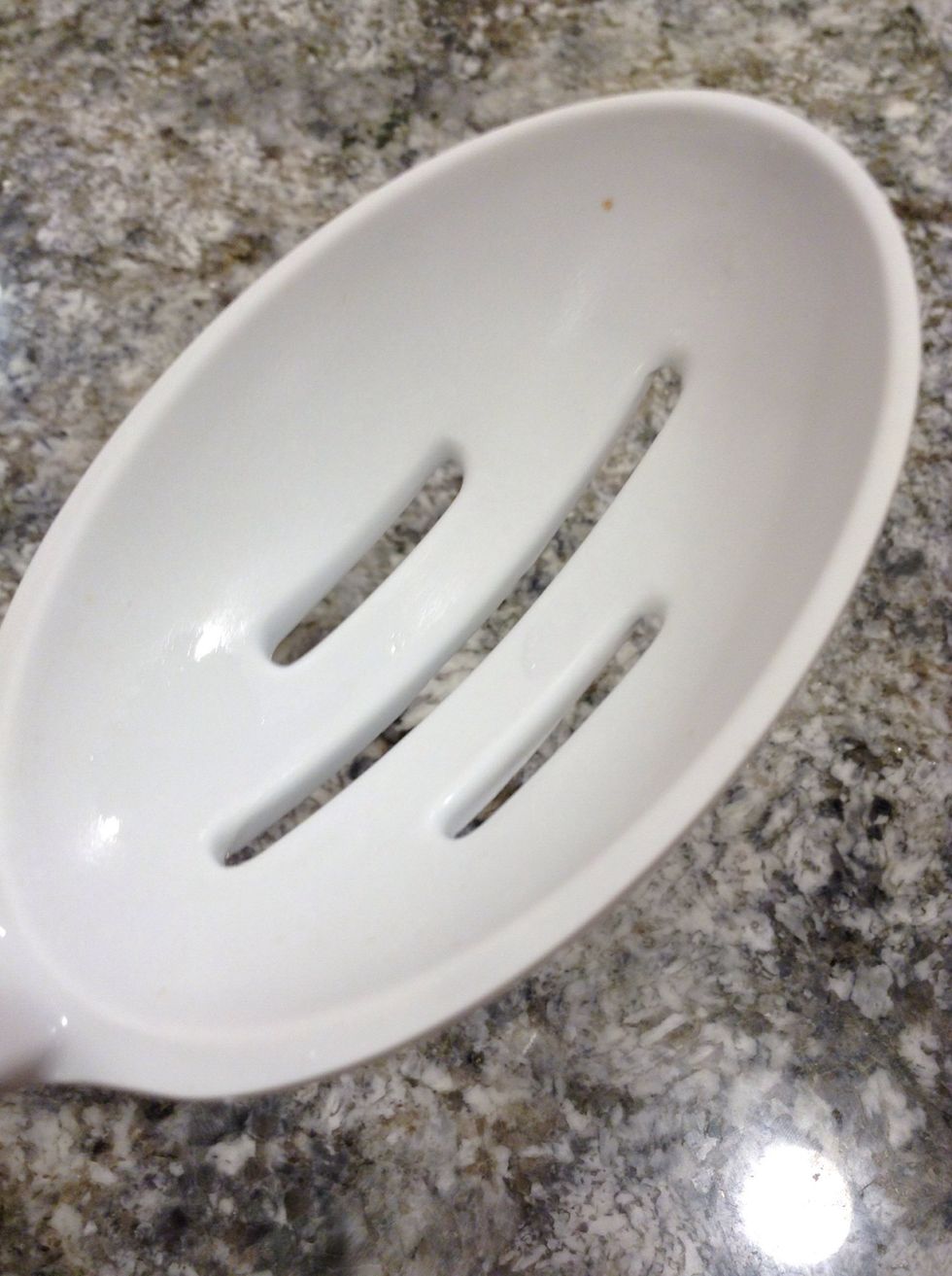 Take the egg out with a slotted spoon.