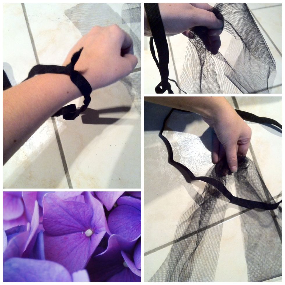 Take the elastic band and put your hand through. Take the strip on the fold we just created and pull it through.