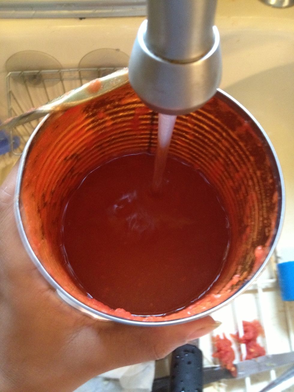 Take the empty can the tomatoes came in and fill it halfway with water