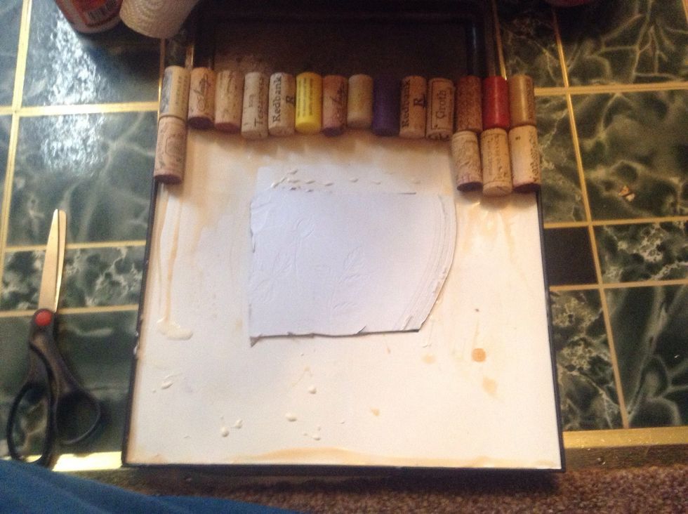 Take the empty picture frame and place cardboard (feel free to use any type of stronger board items)into frame.