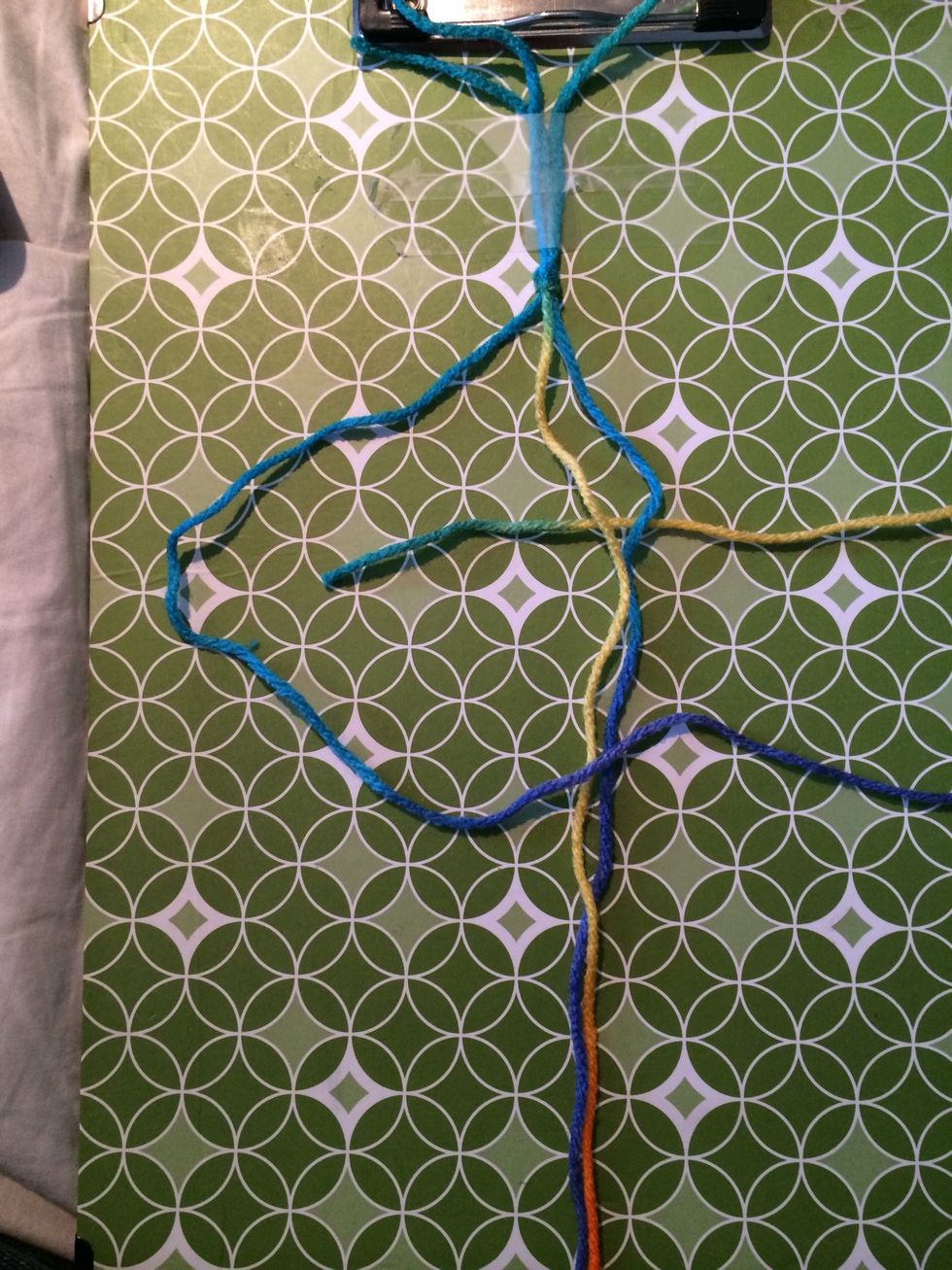 Take the end of that string and put it through the loop of the 4.