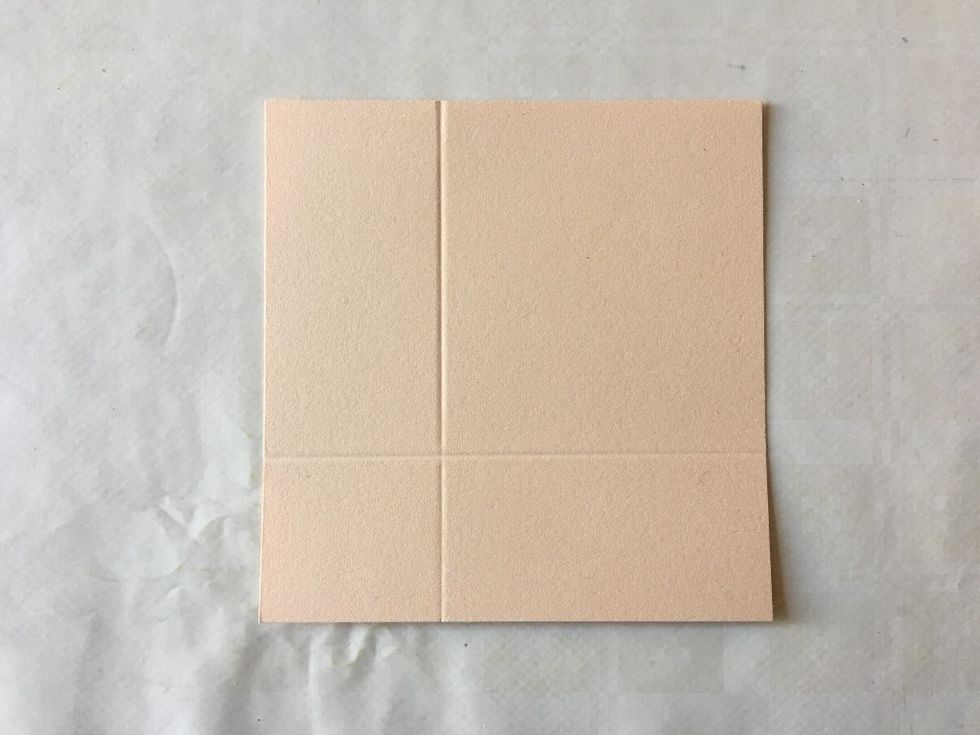 Take the first of the three large pieces and score at 6,4 cm (2\u00bd") on the 9,8 cm (3 7/8\u201d) side and at 7 cm (2\u00be") on the 10,2 cm (4\u201d) side.