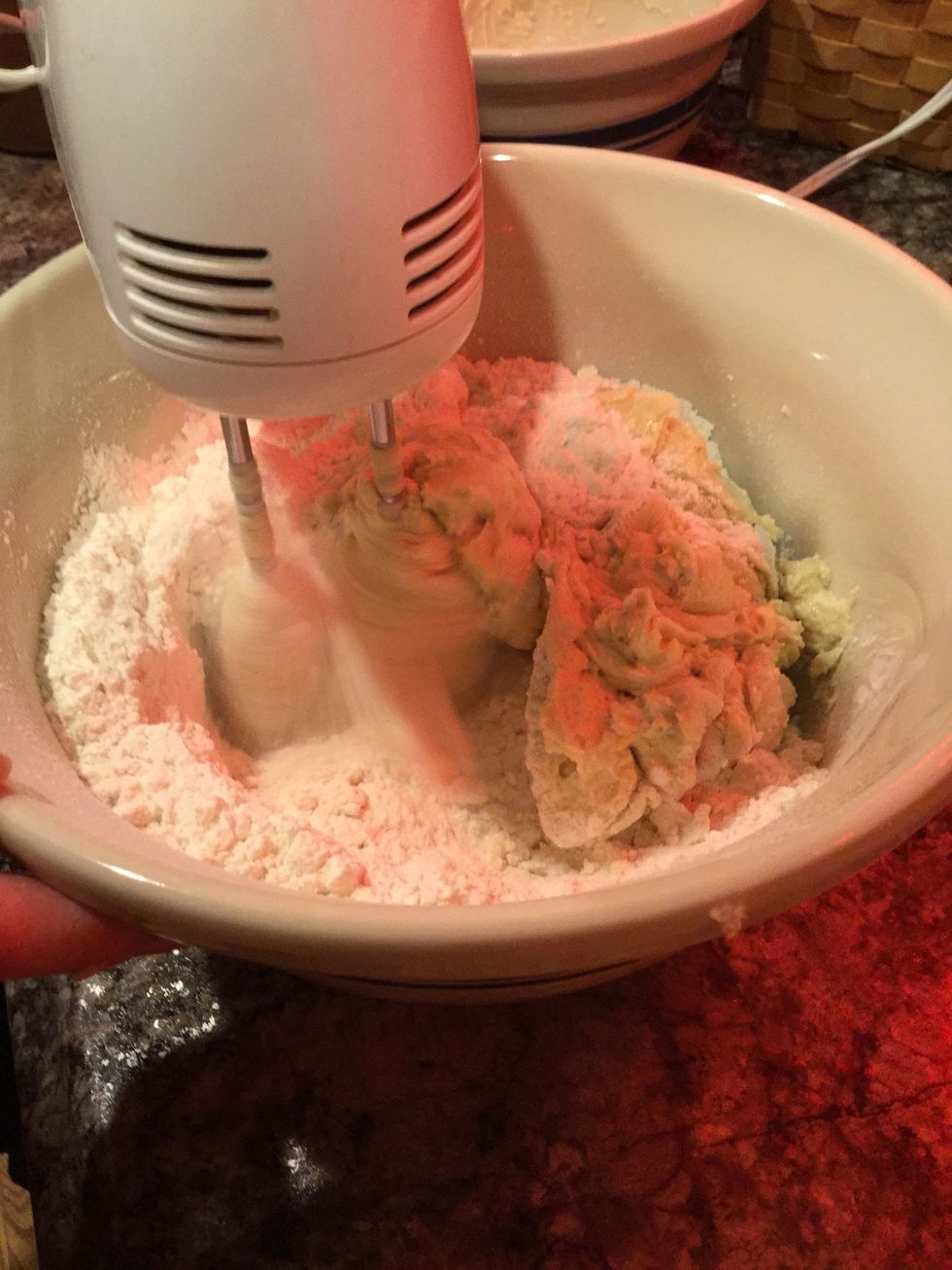 Take the flour, baking powder and salt and put those ingredients into one mixing bowl. Use your mixer and begin to mix.