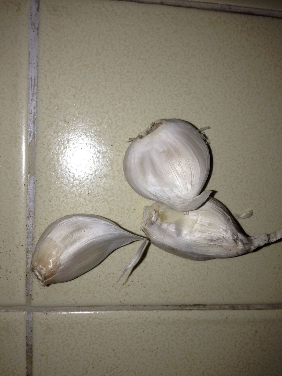 Take the garlic & press into the butter. Put the leeks & garlic in the bacon grease/butter mix.