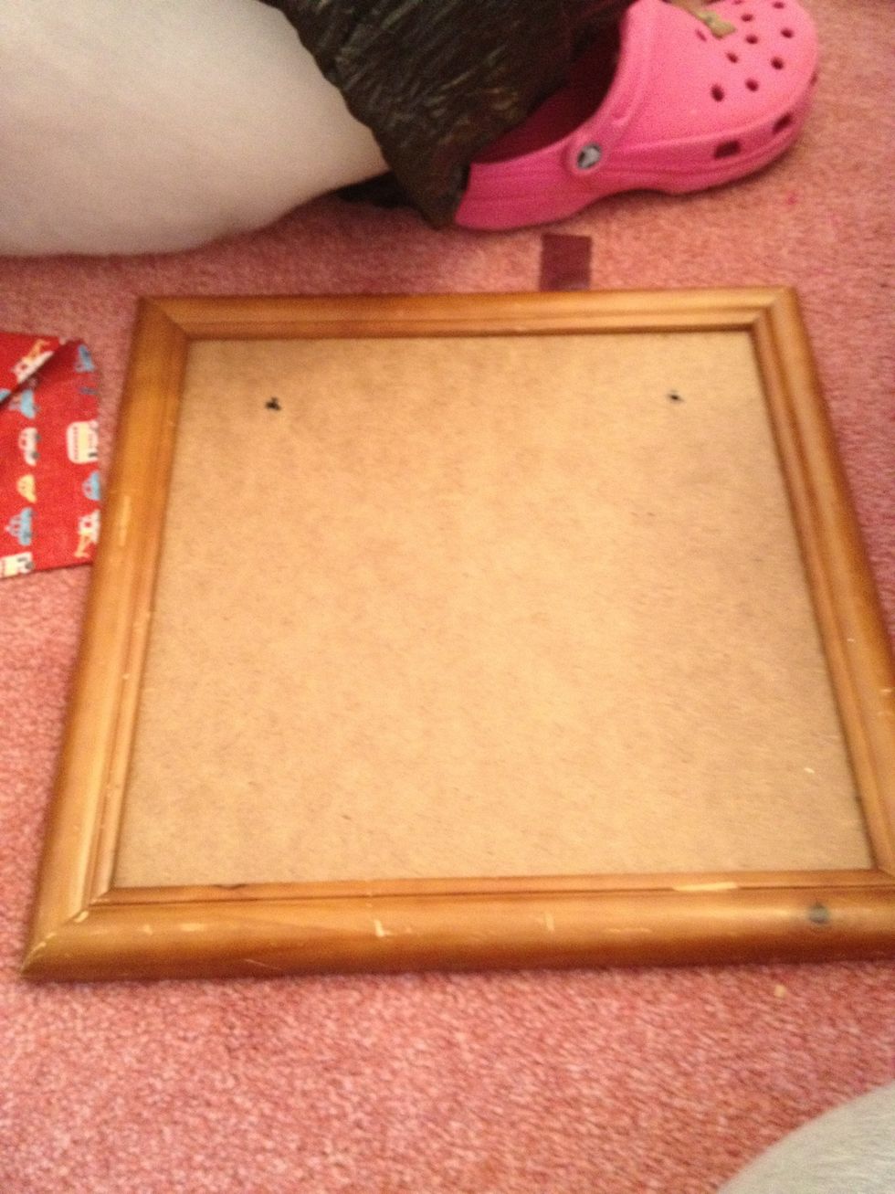 Take the glass out of an old frame and secure the back