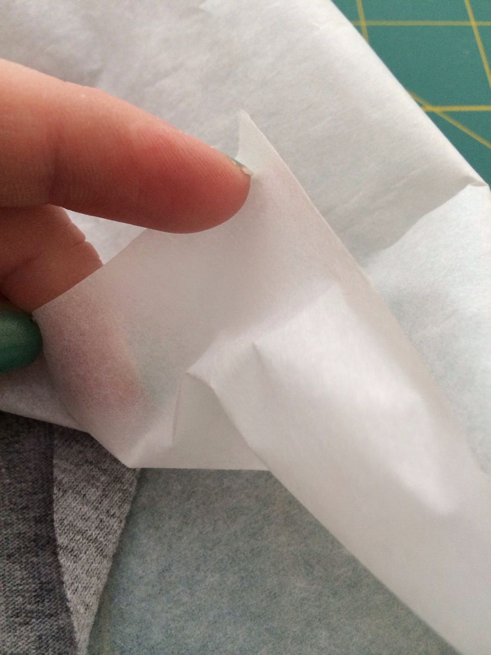 Take the Heat & Bond or other no-sew adhesive and lay it out textured side down on the back of the fabric as per package instructions. I had some old thinner stuff left over from another project...