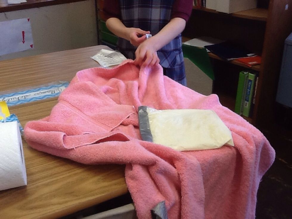 Take the ice cream out of the bag and rub off the rock salt. Be sure the salt does not get into your ice cream or else it will be icky!