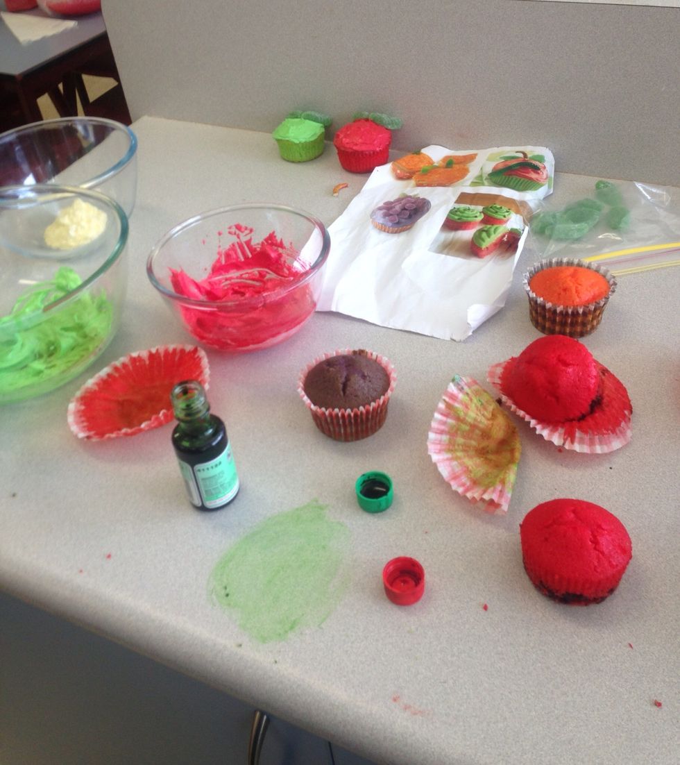 Take the icing and separate it into 4 different bowls. Then, color the icing to the colored fruits that you desire.