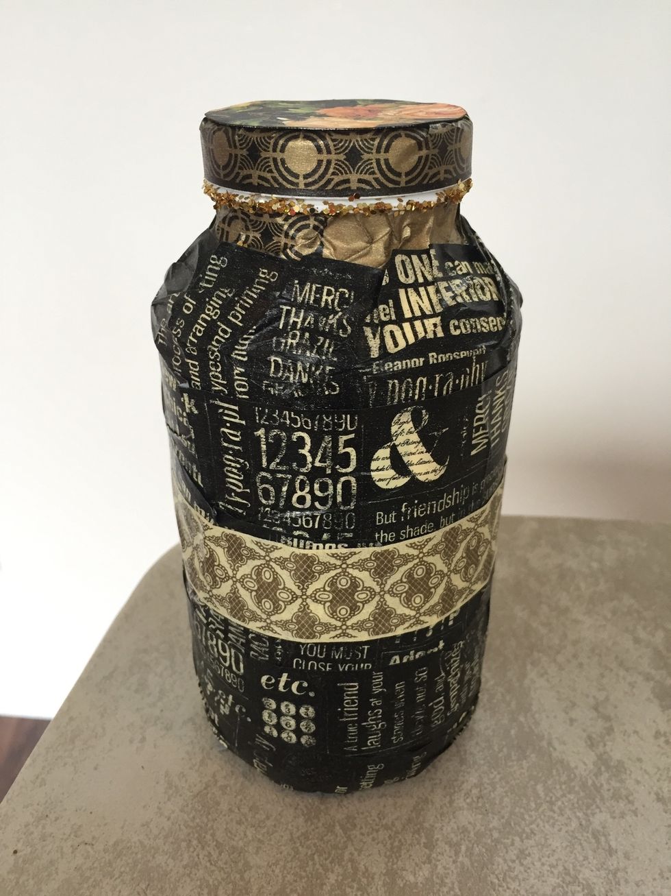 Take the ivory and gold washi and wrap around the middle of your bottle.