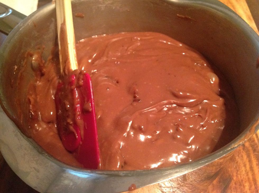 Take the larger amount of chopped bacon and stir into the fudge.