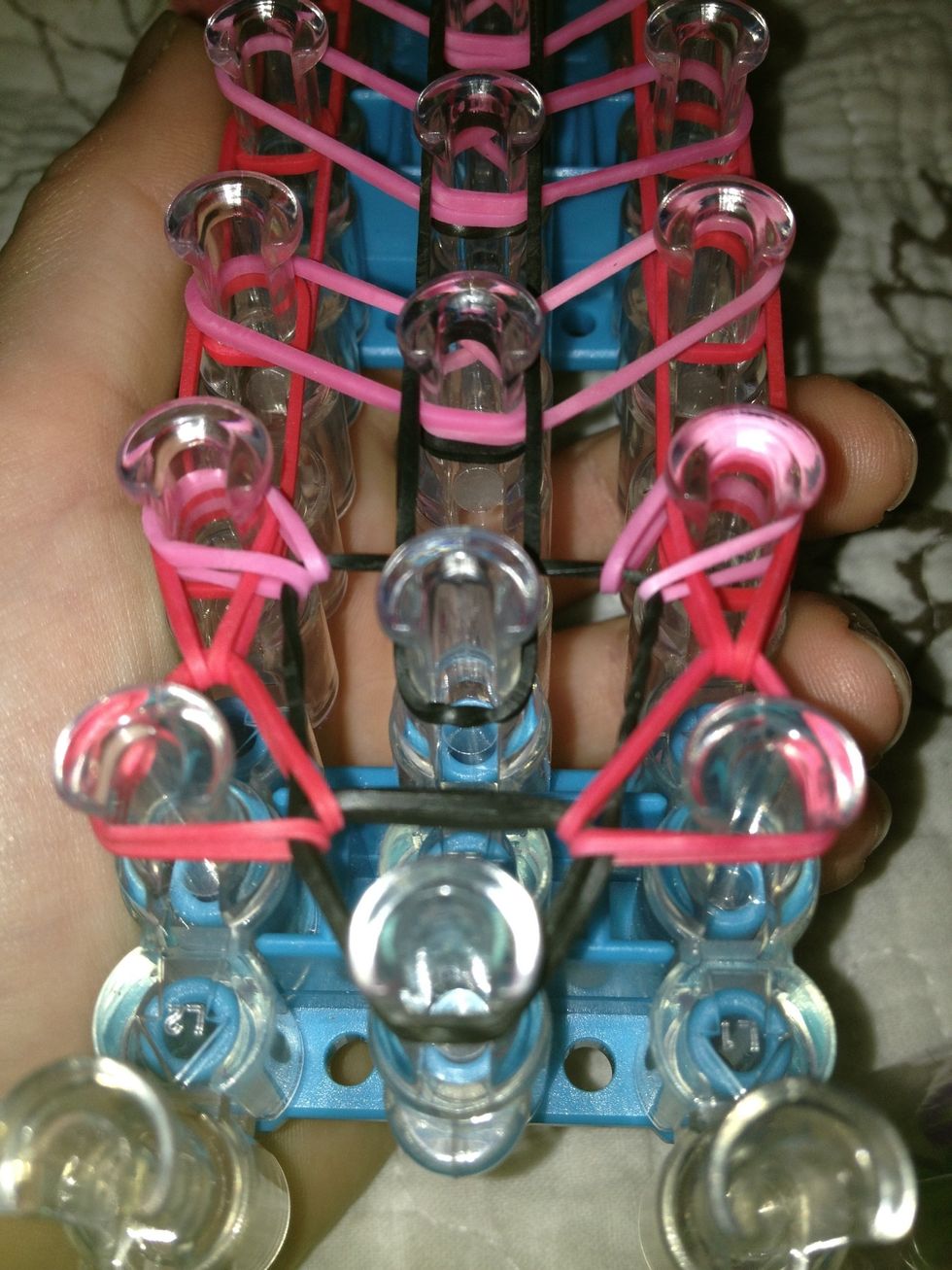 Take the last band pull it forward and go to the left take the last band pull it forward do the same on the right