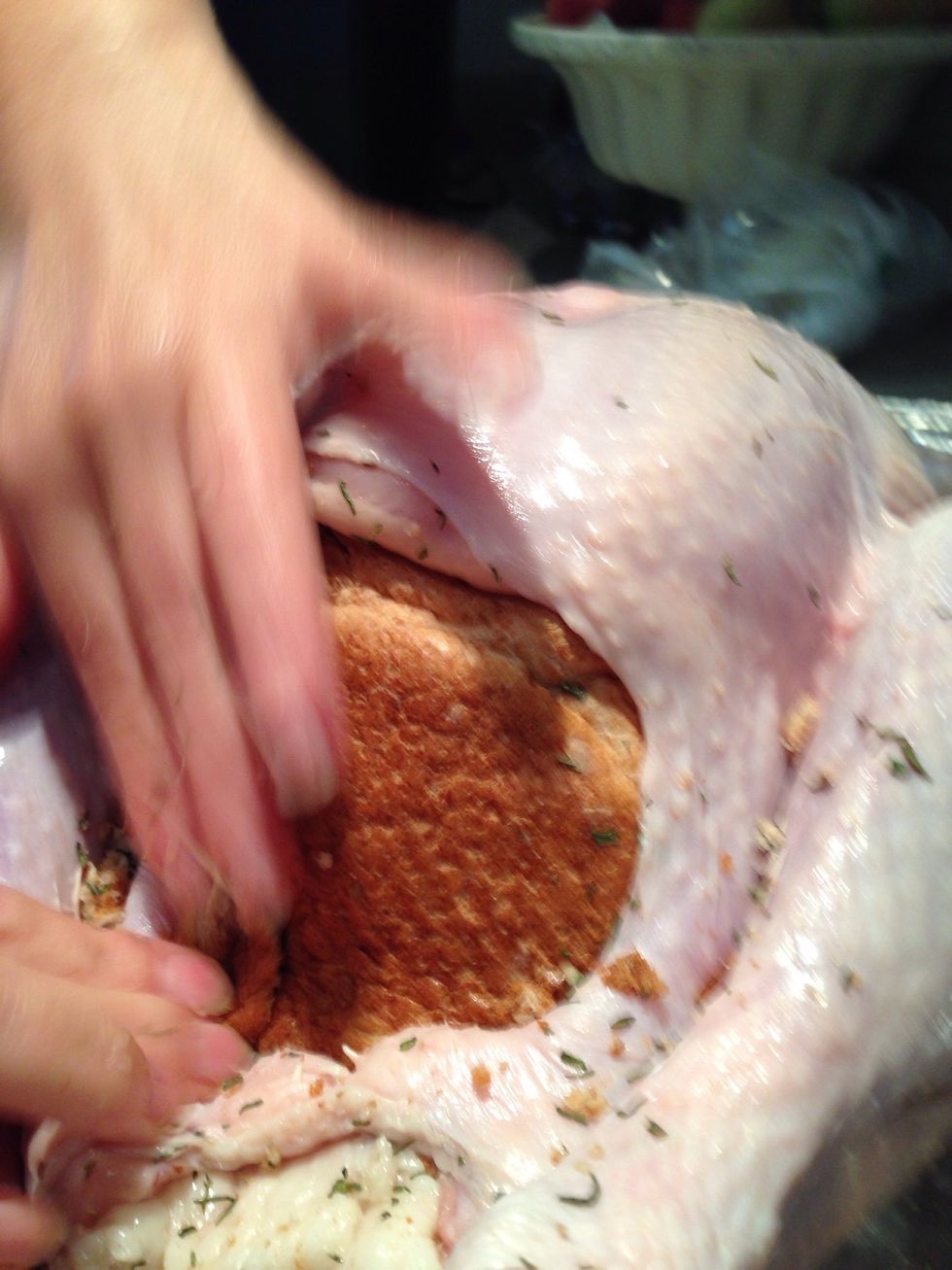 Take the last piece of bread and place it over the stuffing. This will prevent the stuffing from drying out. You will not need to tie the cavity closed if you use this method.