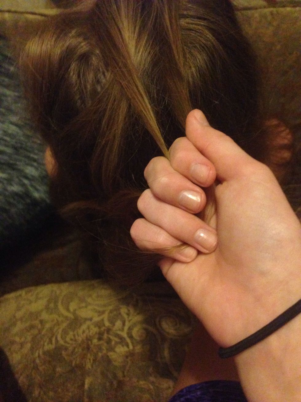 Take the left end and put it between the middle and first finger.