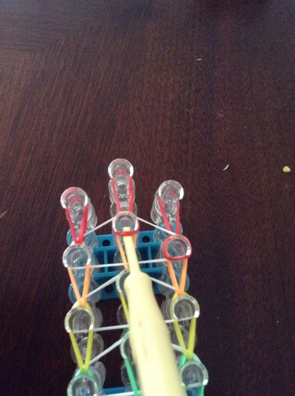 Take the middle red on the orange