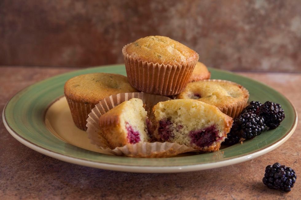 Take the muffins out of the pan and let them cool on a baking sheet. Serve them up and enjoy!