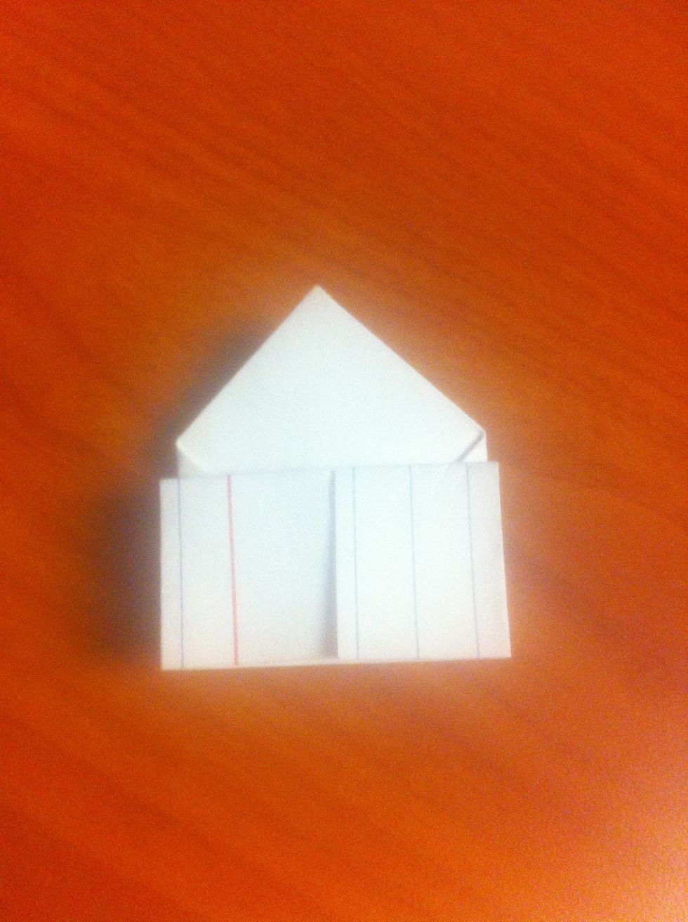 Take the new top edge and fold it down to the new bottom edge. Essentially, fold the new section in half.