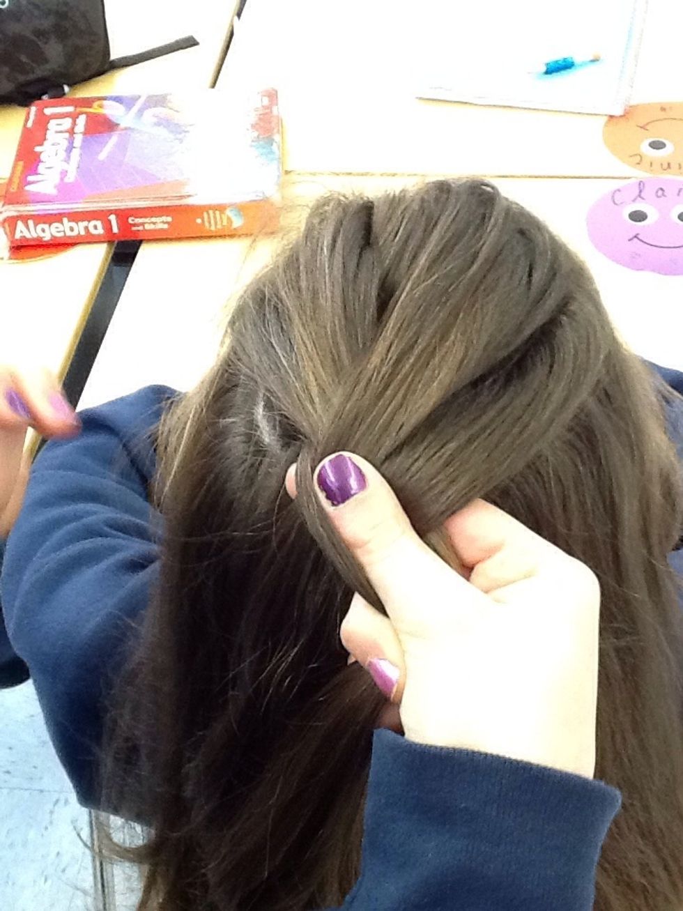 Take the next left most piece and take a piece of hair from the head
