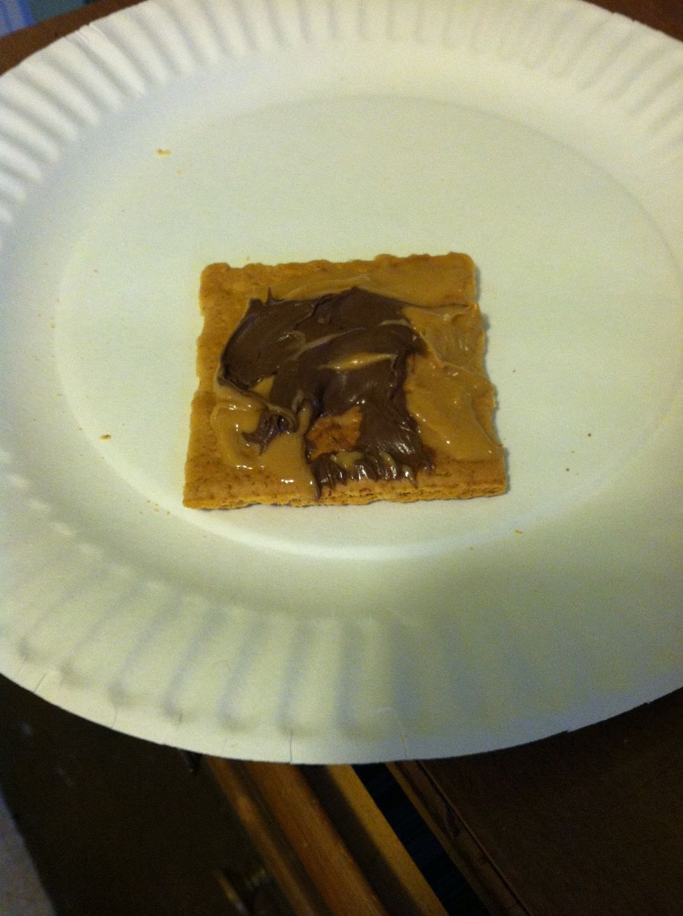 Take the other half out and spread a little pb and some Nutella on (or whatever other choc you have) I put this half in the oven too because it melts everything better!