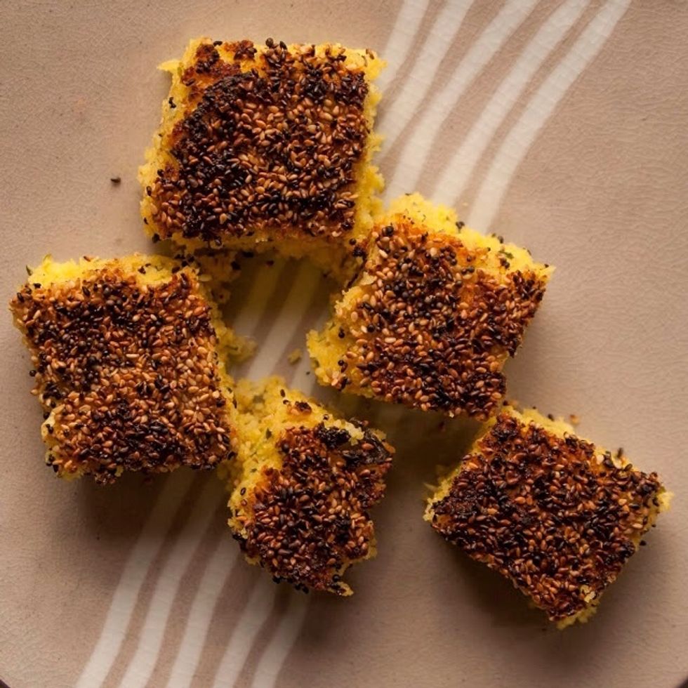 Take the pan out and let the cake rest for about 10 to 15 minutes, then cut it up and serve.