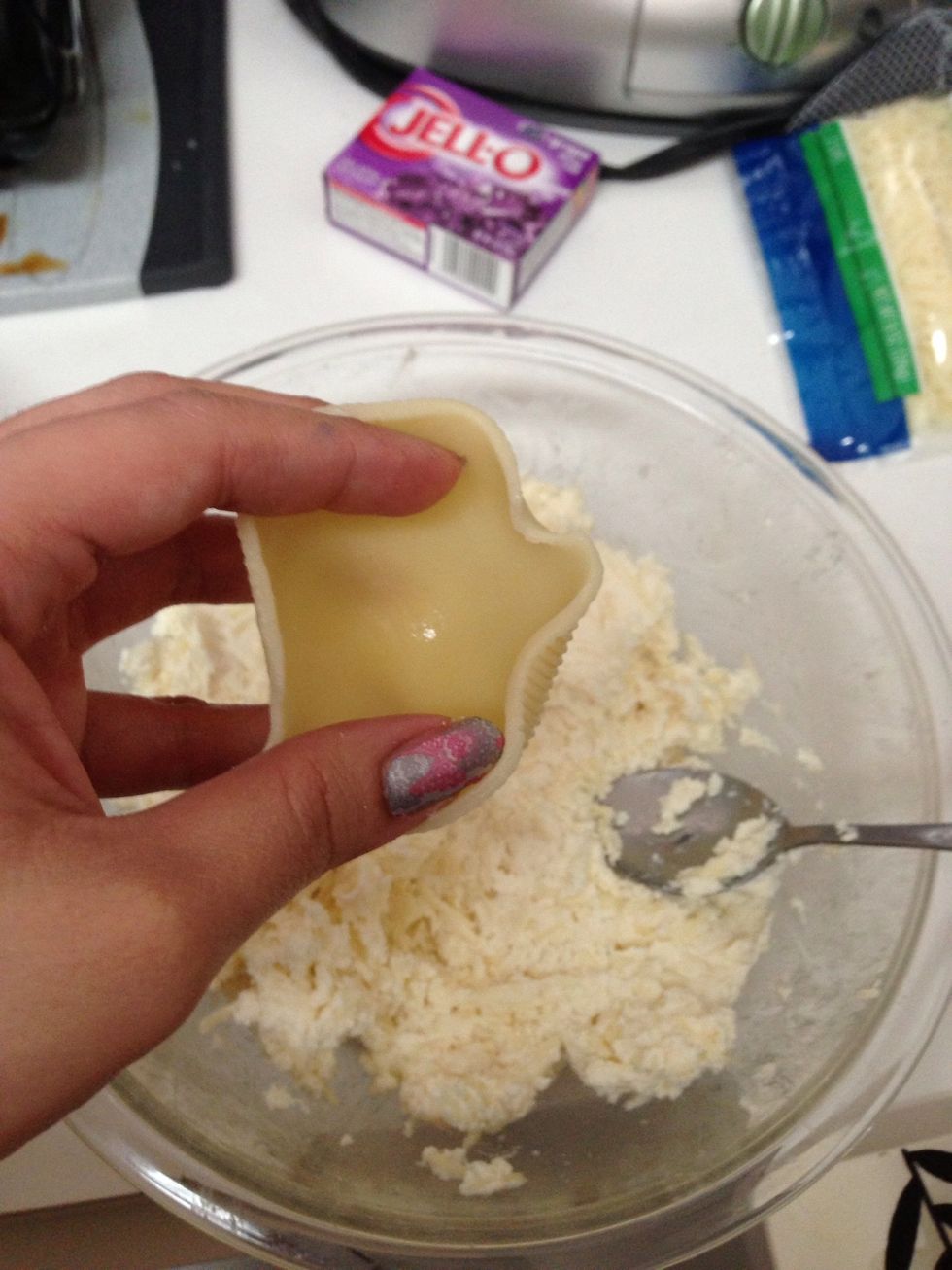 Take the pasta shells individually and stuff them with about a tablespoon of the cheese mixture.