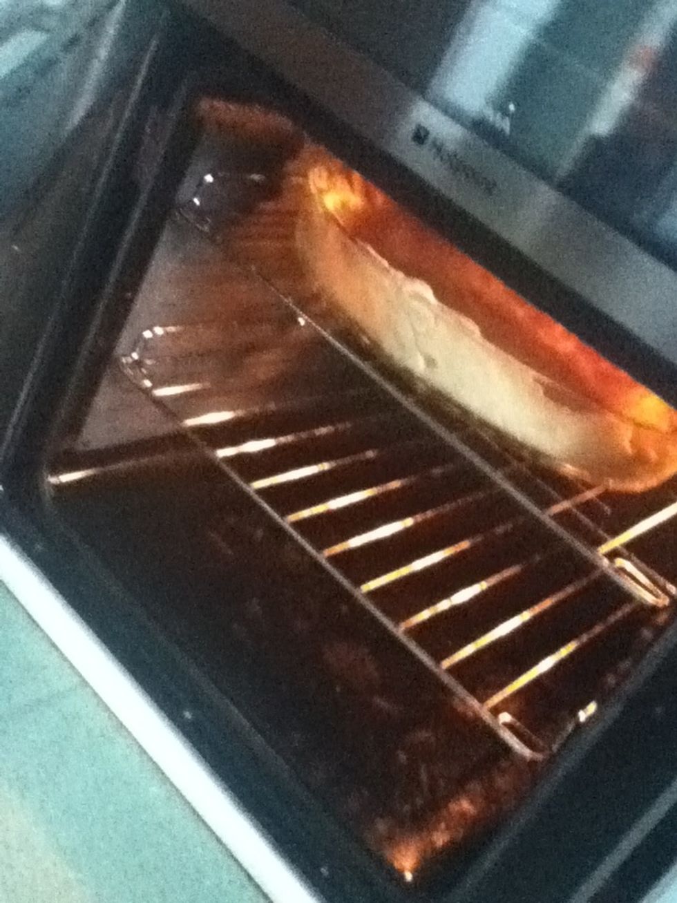 Take the pastry out and remove the coins and greaseproof paper and put back in the oven for 8 minutes.