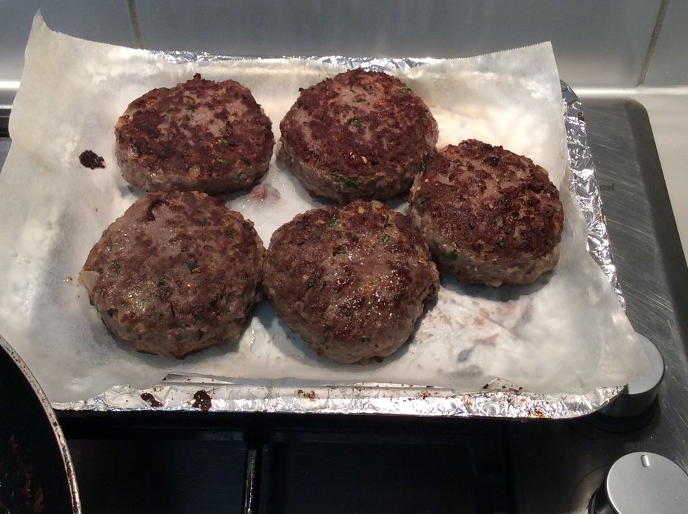 Take the patties off the pan and place into a tray