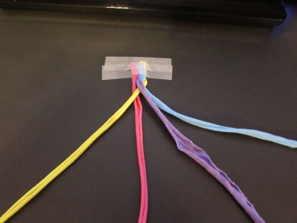 Take the PINK and put it under the YELLOW.