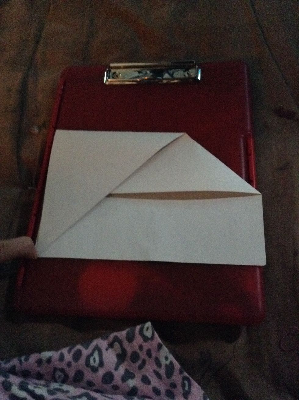 Take the point on top of ur triangle and bring it all the way down to make it look like this.