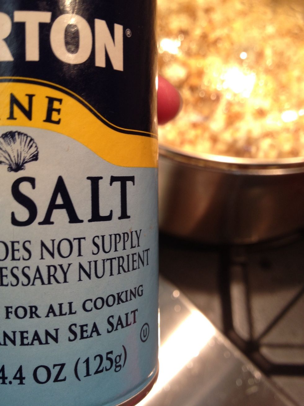 Take the pot off of the heat. Add salt to your liking and shake it up again.