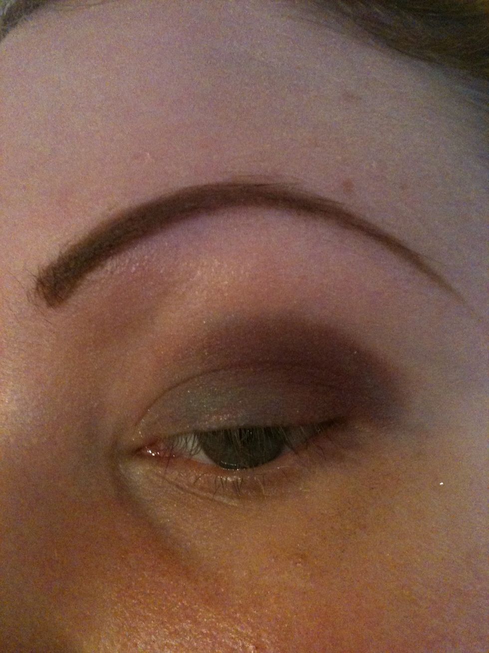 Take the red and focus it more on the crease of your lid, then blend it a little with the outer edge of the green.