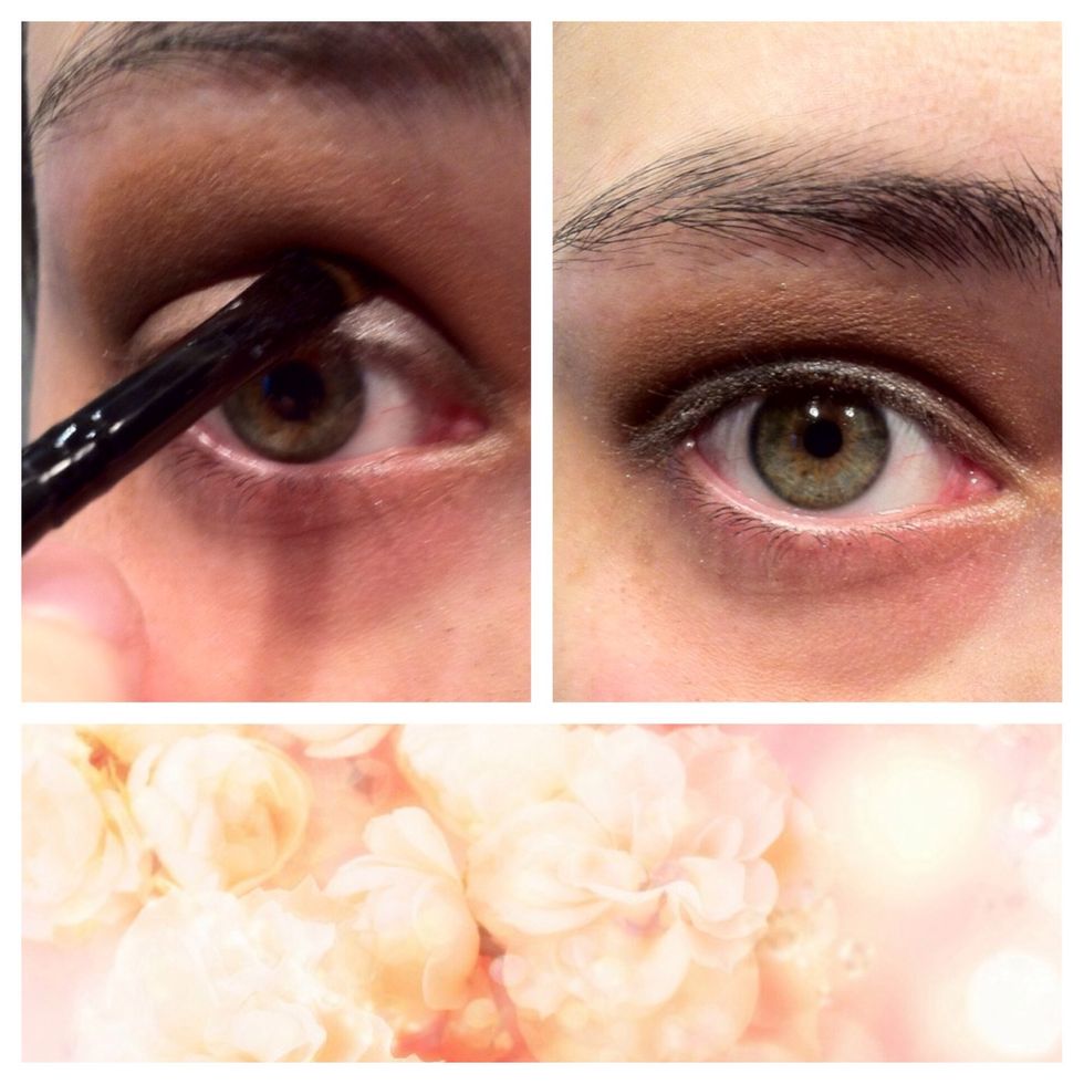 Take the same colour with an angle brush, look straight ahead and intensify the dark line, while your eyes are still open. Blend everything well to get rid of the hard edges.