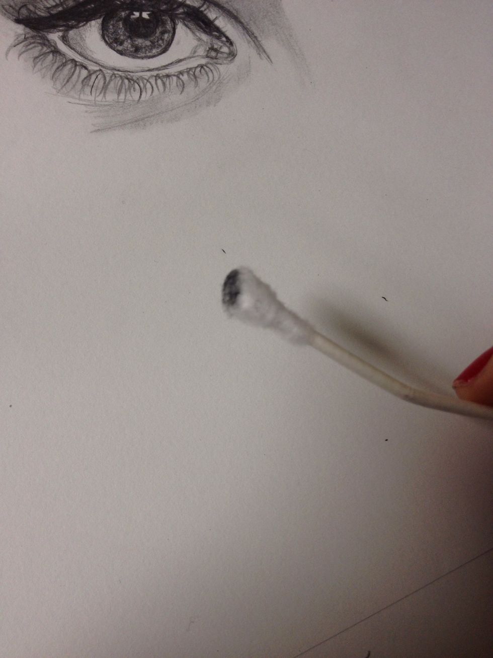 Take the same q-tip and run it through the eyebrow once.
