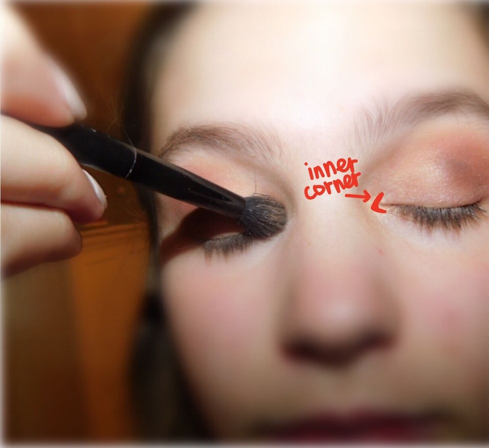 Take the same shimmery color and apply it on the inner corner of your eye. This metallic color will make the eyeshadow pop.