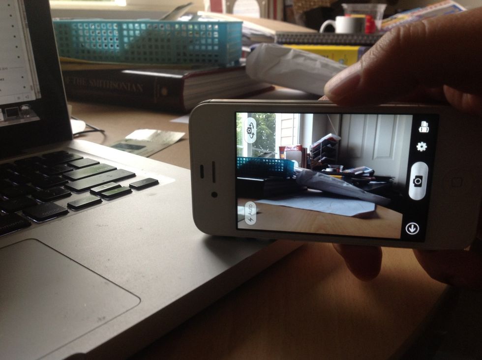 Take the second photo, now you have an empty background photo.