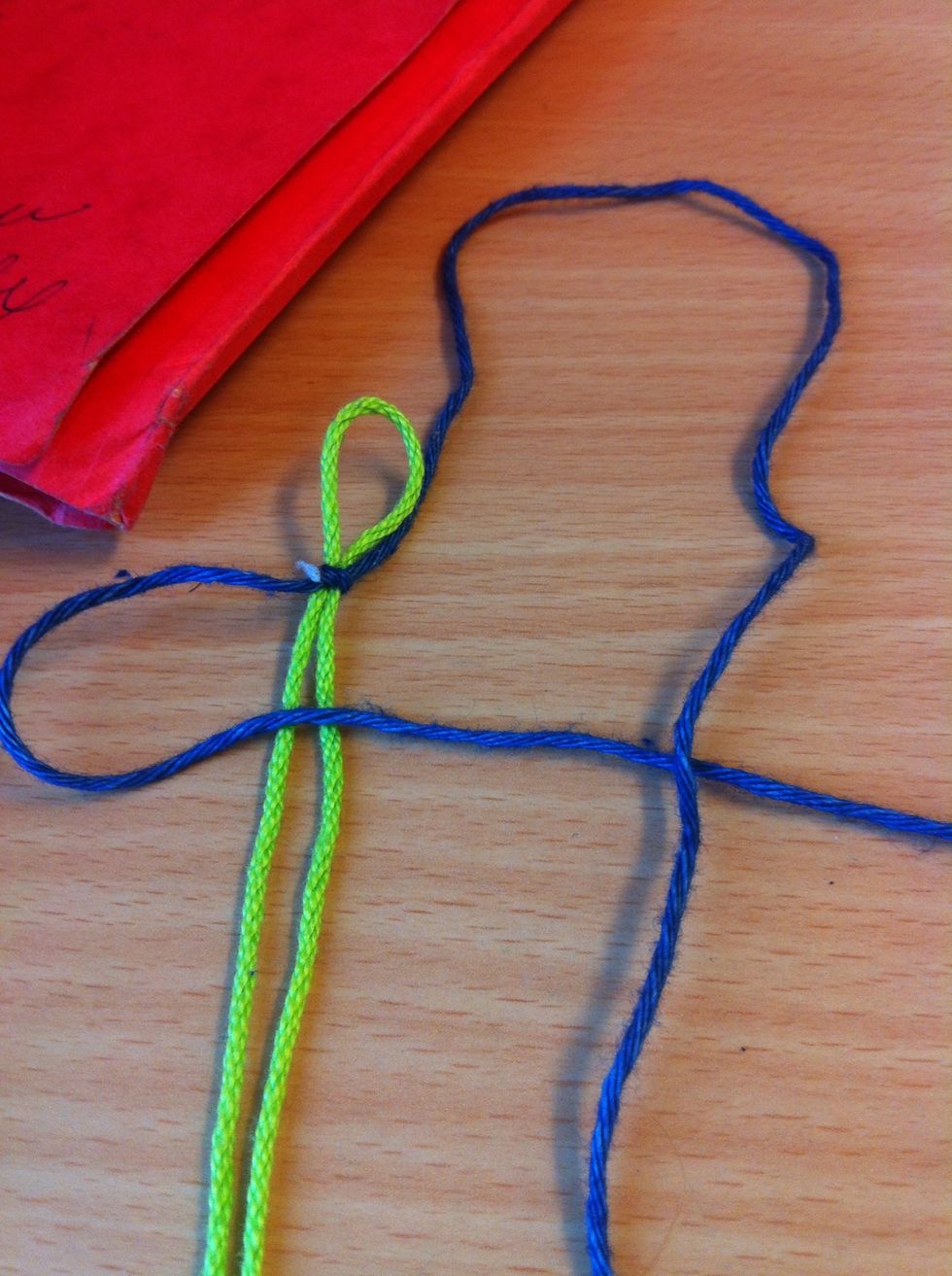 Take the second piece and lay over the blue that is over the green