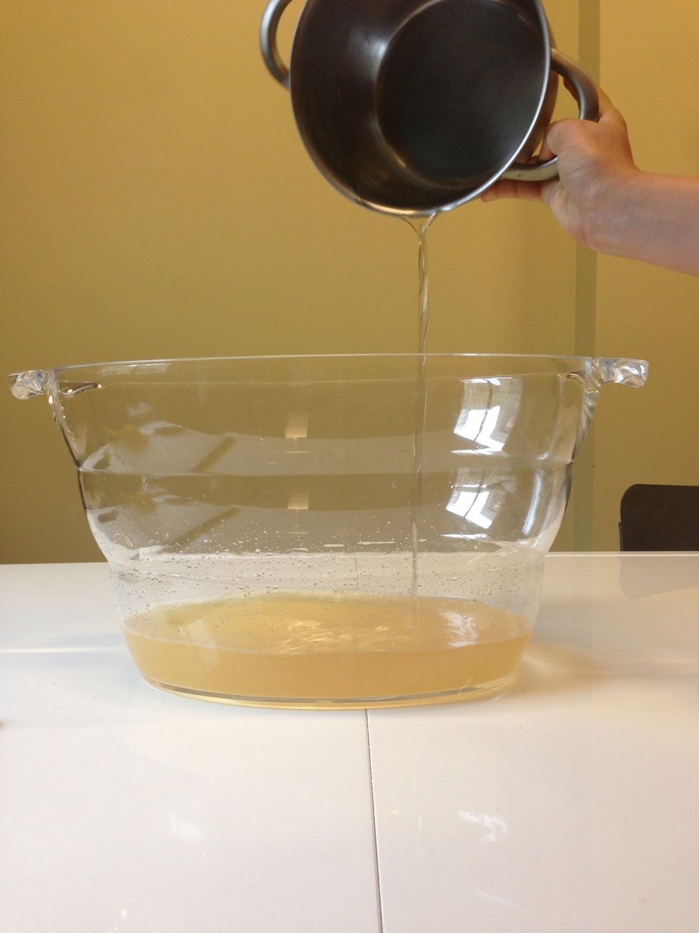 Take the simple syrup out of the fridge and add it to the punch.