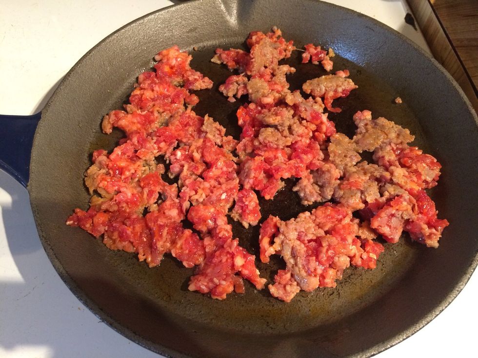 Take the skin off the sausages. Cook the sausage and break it up into smaller pieces.