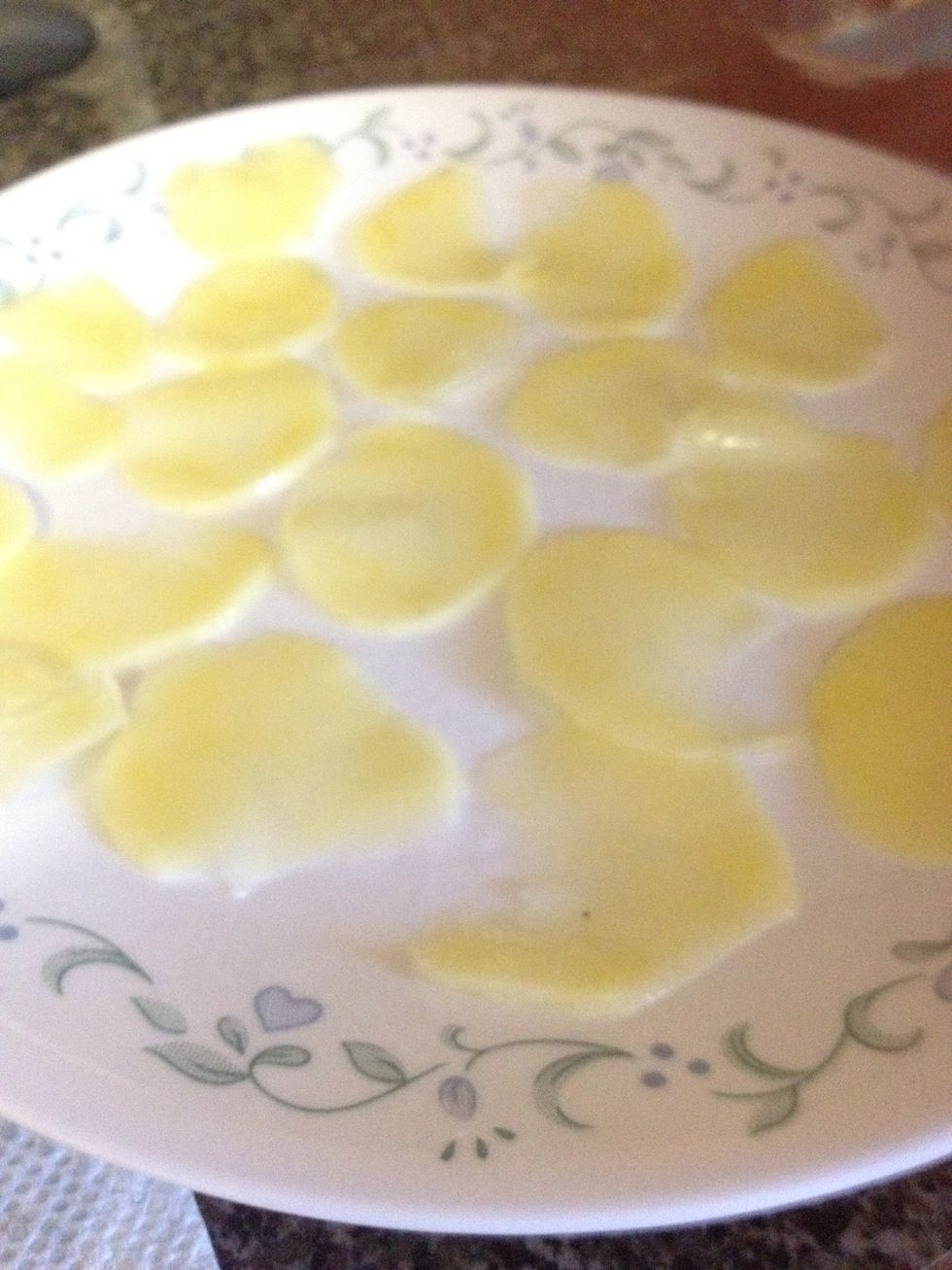 Take the slices out of the bowl, dry on a paper towel, place on plate, and lightly cover the tops with oil. NOW, is the best time to put salt and pepper on them.